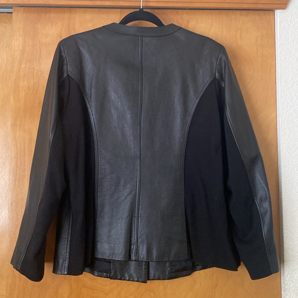 Anne Klein
Mandarin Collar
Lined, Soft Leather
Cloth Back & Arm Panel - Picture 2 of 7